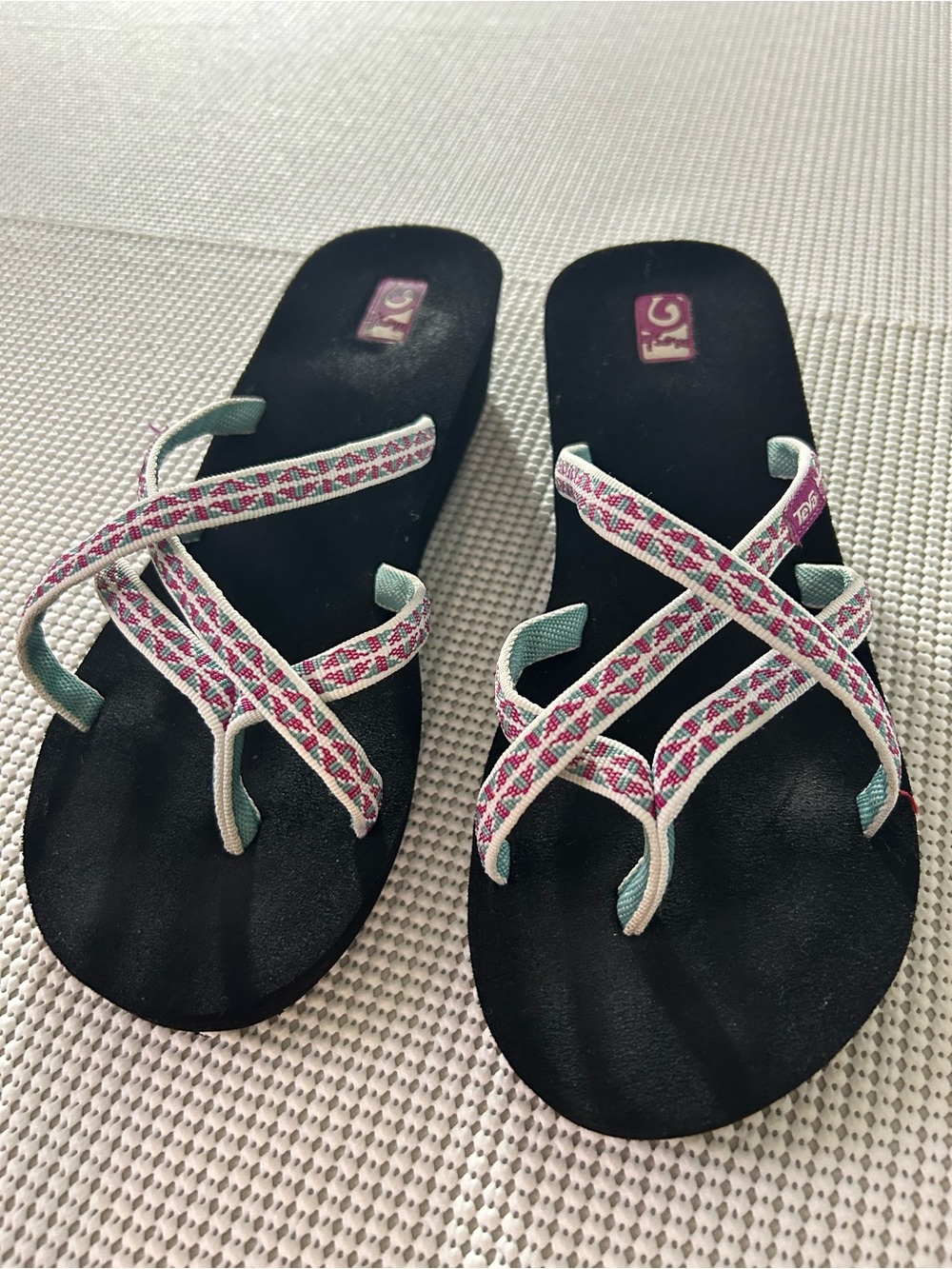 Teva Women's Black Sandals with Pink Patterned Crisscross Straps